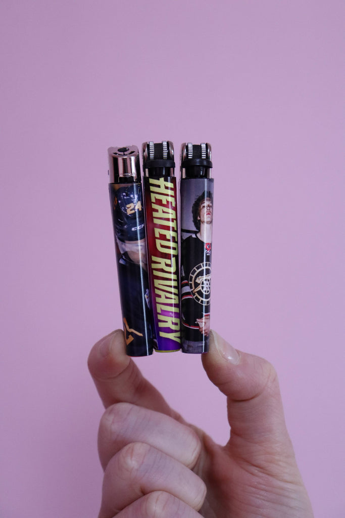 The Rival Lighter Heated Rivalry Lighters - Face Off | Hartford Prints