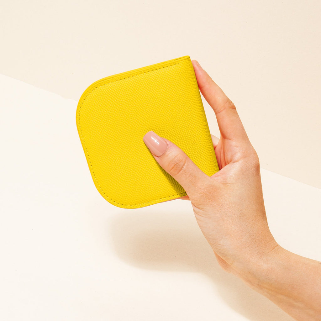 Dome-Wallet-Hand-Model-Yellow_1920x